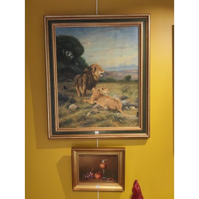 Huile sur toile lions dans la savane signée